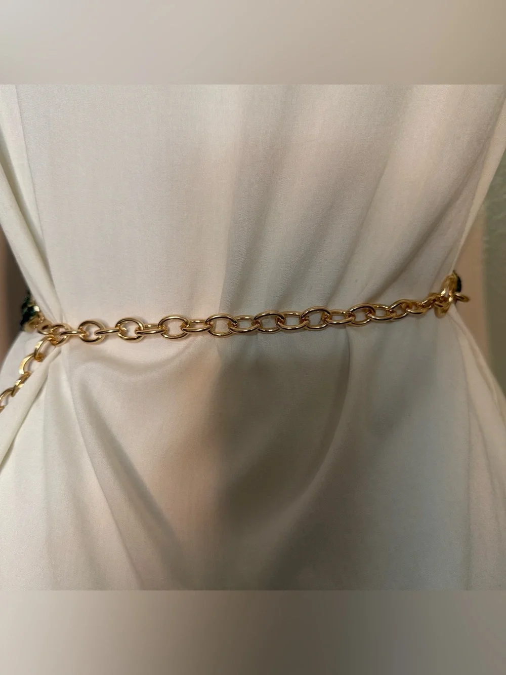 Gold tone metal chain belt with green plastic links
